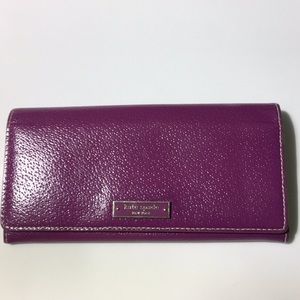 Kate Spade leather wallet with polka dot lining